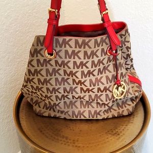 Red and tan Michael Kors signature logo purse